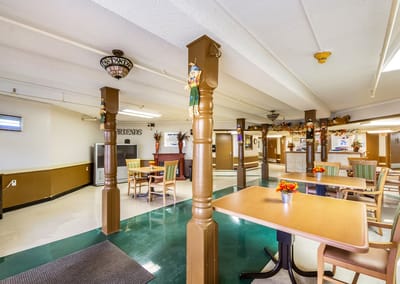 Bright common area with tables and decor
