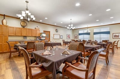 Dining room with tables set for a meal