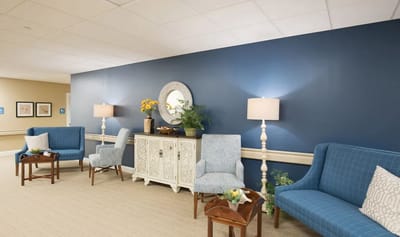 Common area with seating, plants, and decor