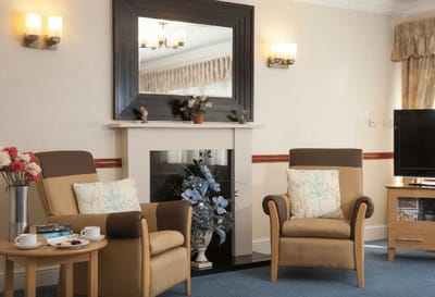 Cozy lounge area with comfortable chairs and decor