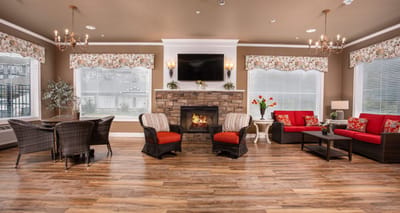 Cozy common area with a fireplace and seating