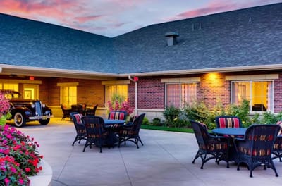 Outdoor courtyard with seating and flowers