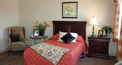 Cozy bedroom with floral decor and warm lighting