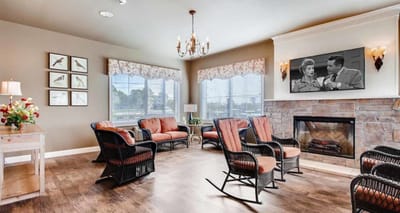 Cozy common area with seating and a fireplace