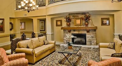 Cozy common area with seating and a fireplace