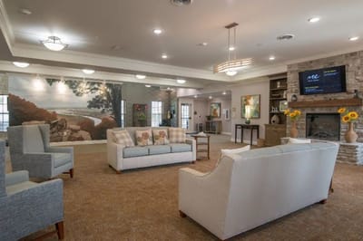 Comfortable common area with seating and artwork