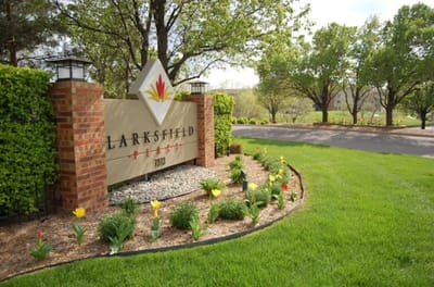 Entrance sign and landscaping of Larksfield Place