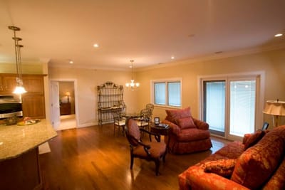 Bright common area with a living space and kitchen