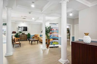 Bright common area with seating and decor