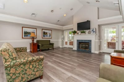 Interior common area with seating and fireplace