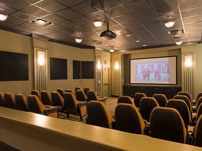 Interior view of a cinema room with seating