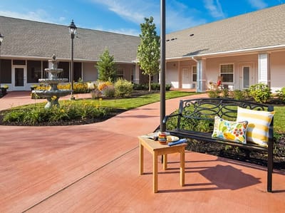 Outdoor courtyard with seating and a fountain