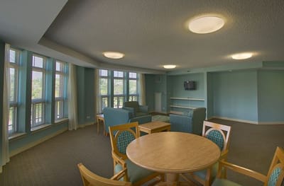 Bright common area with seating and decor