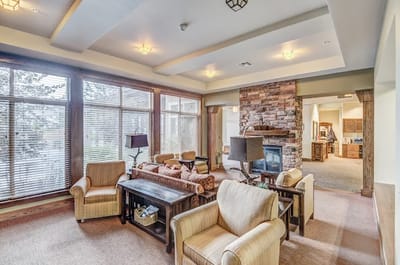 Common area with seating and a fireplace