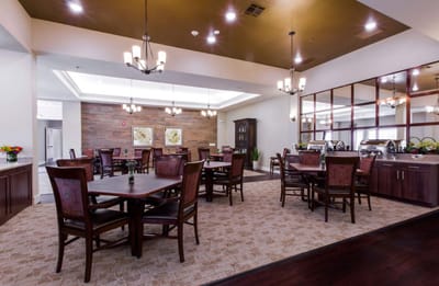 Bright dining room with wooden tables and chairs