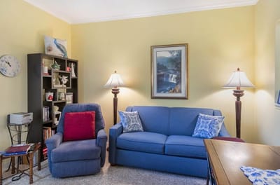 Cozy interior living space with sofa and lamps