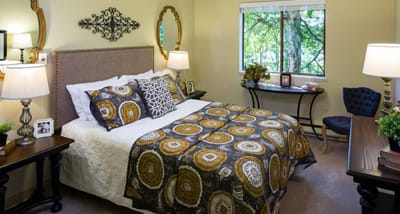 Cozy resident room with a bed and natural light