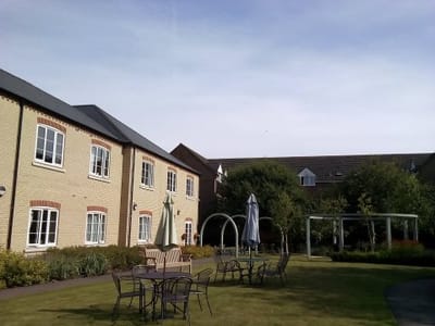 Outdoor seating area with landscaped garden
