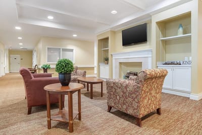 Interior view of a cozy common area with seating