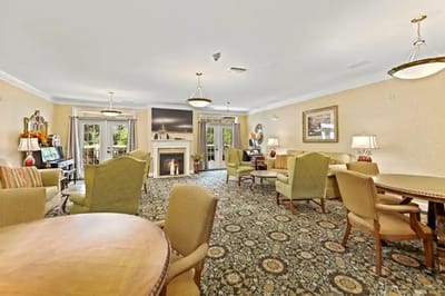 Lounge area with cozy seating and a fireplace