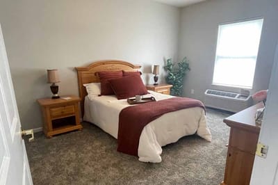 A cozy, well-decorated resident bedroom