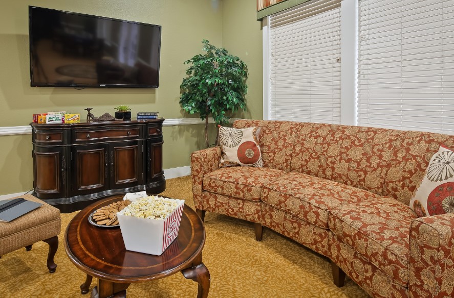 Cozy common area with a couch and snacks
