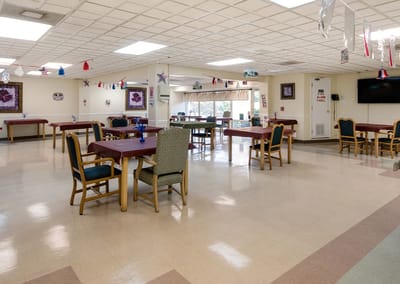 Dining room area with tables and chairs