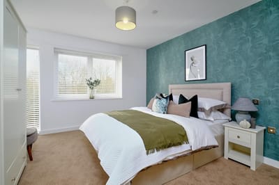 Cozy bedroom with modern decor and soft lighting