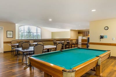 Interior view of a common area with a pool table
