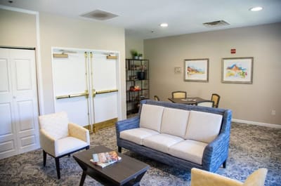 Bright common area with seating and art