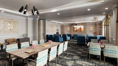 Bright interior common area with chairs and tables
