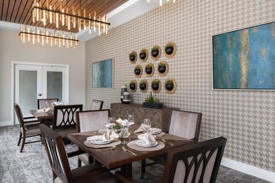 Elegant dining room setting with decorated tables