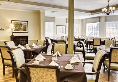 Dining room with elegantly set tables for meals