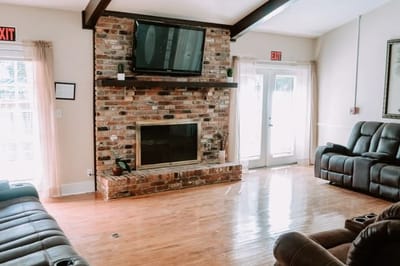 Common area with seating and a fireplace