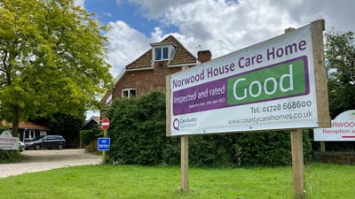 Sign for Norwood House Care Home with facility name visible