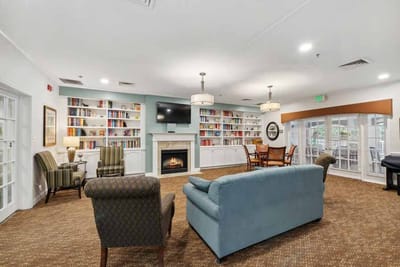 Common area with seating and bookshelves