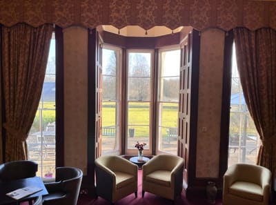 Cozy interior view with window overlooking the garden
