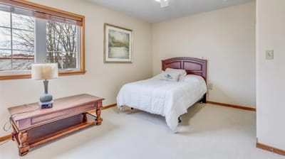 Simple, bright private bedroom in an assisted living facility