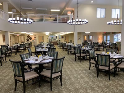 Dining area with tables set for a meal