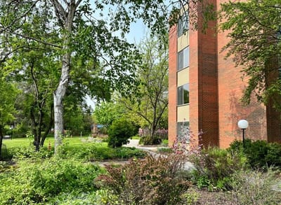 Exterior view of the facility surrounded by landscaping