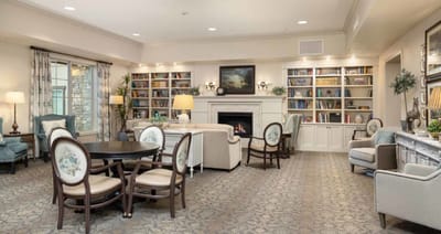 Cozy common area with seating and bookshelves