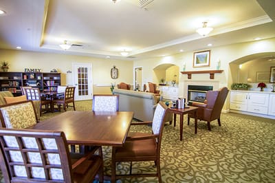 Common area with seating and bookshelves