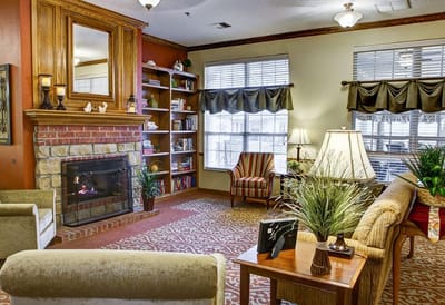 Cozy common area with furniture and fireplace