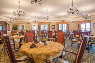 Interior of a dining room with ornate chandeliers