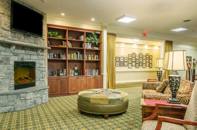 Cozy common area with bookshelves and seating