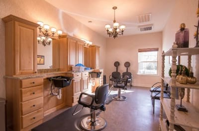 Interior view of a beauty salon with styling chairs