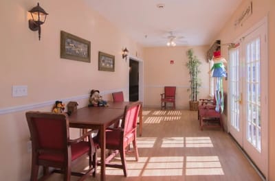 Bright common area with chairs and tables