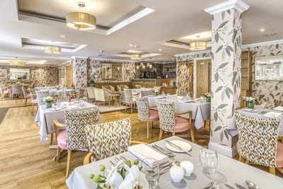 Dining area with elegant decor and table settings
