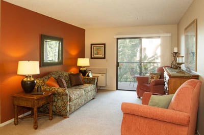 Cozy living room with seating and large window