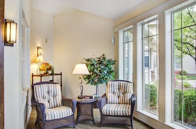 Bright common area with comfortable seating and natural light